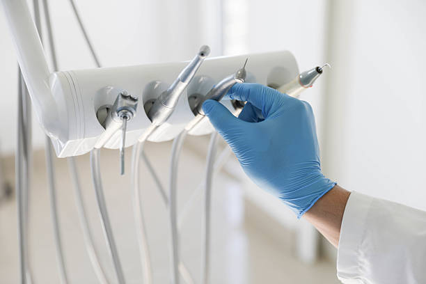Professional Dental Implants technician working in Elm Springs, AR